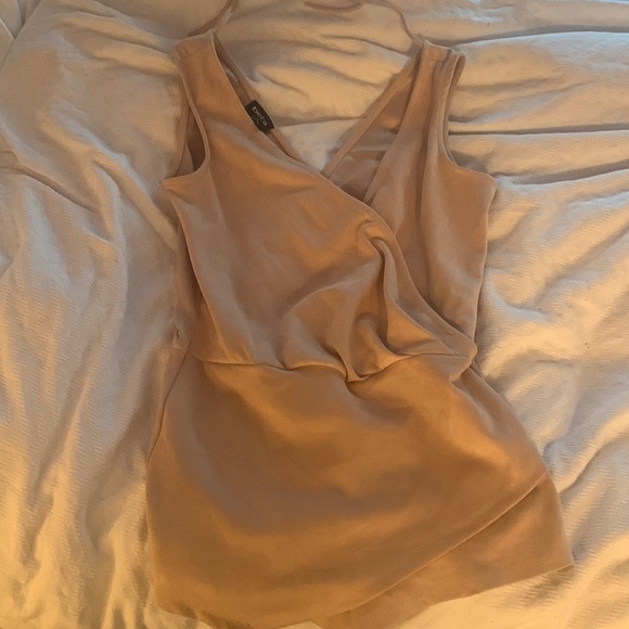 Super cute romper nude colour. Looks like a mini dress in the front. - Picture 1 of 1